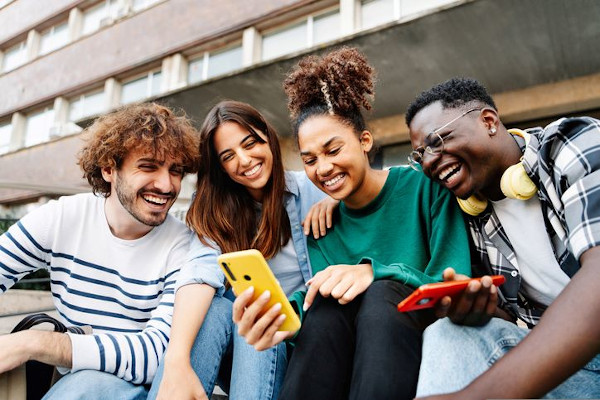 Friends looking at their phones